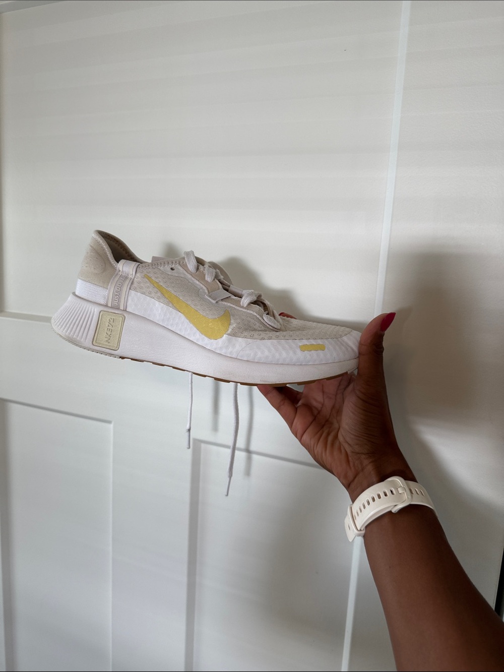 Nike Women's Athletic Shoe in Cream with Pale Yellow Swoosh